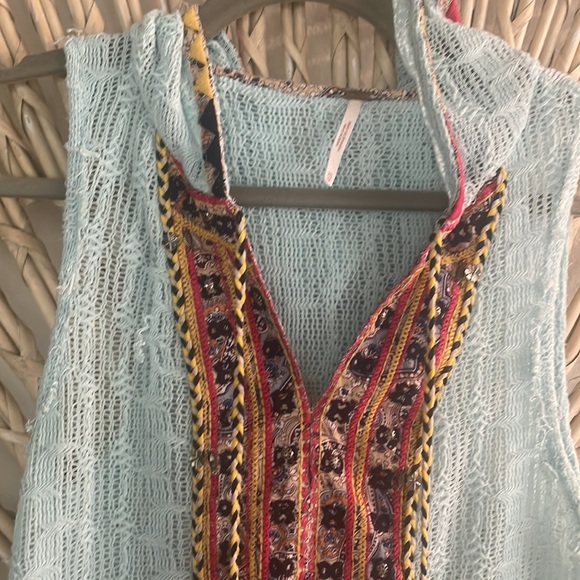 Free People XS sleeveless tunic wit hold. Slightly distressed.Beautiful colors - Picture 4 of 6
